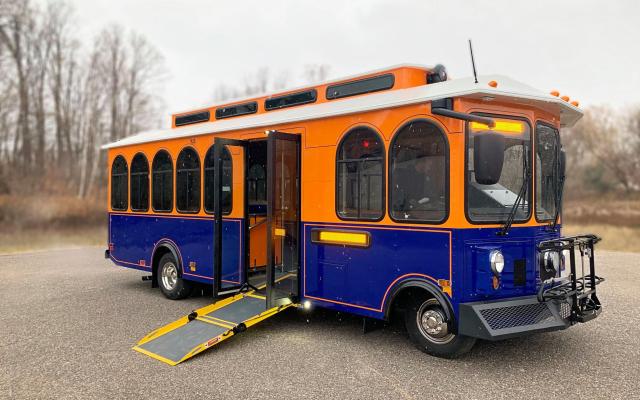a trolley bus with an ada accessible ramp